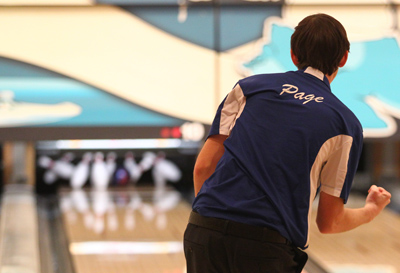Centennial’s Garrett Page reacts after scoring a strike during team play against Green ...
