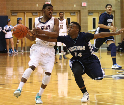 Centennial’s Khalil Thompson attempts to steal the ball from Legacy’s Fredrick P ...