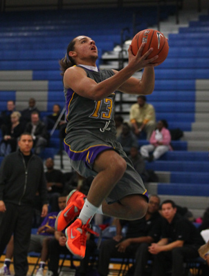 Durango’s Paris Estrada jumps for a shot against Canyon Springs during a basketball ga ...