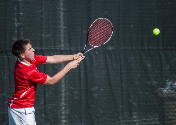 Tech’s Christian Valle reaches for a backhand.