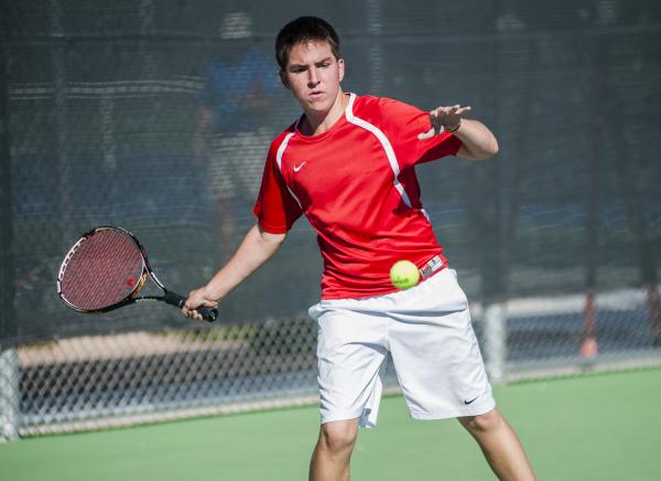 Tech’s Christian Valle hits a forehand.