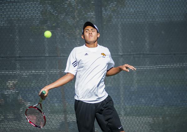 Clark’s Miko Pasimio eyes a forehand.