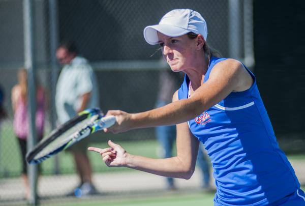 Bishop Gorman’s Julia MacDonald concentrates on a shot in the girls doubles final.