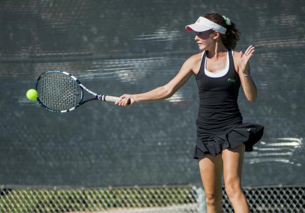 Palo Verde’s Annie Walker hits a forehand in the girls singles championship match.