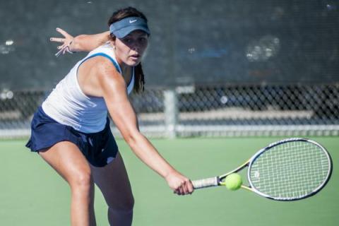 Centennial’s McKay Novak reaches for a backhand on her way to winning the Division I g ...