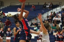 Liberty’s Sydney Clark jumps for a shot as she is fouled by Coronado’s Skyler Fe ...