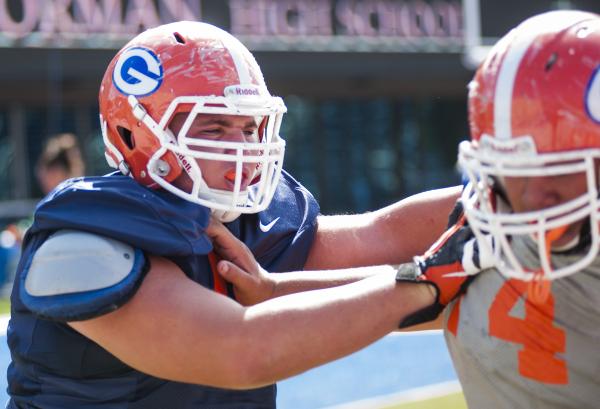 Bishop Gorman senior Zack Singer, left, shown Wednesday at practice, embraces his move to ce ...
