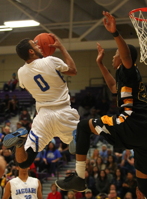 Desert Pines’ Julian Jacobs shoots against Clark during the Division I-A Southern Regi ...