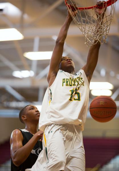 Ray Smith, a junior-to-be at Las Vegas High, dunks for the Las Vegas Prospects 16s in their ...