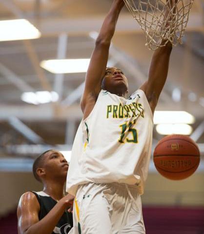 Ray Smith, a junior-to-be at Las Vegas High, dunks for the Las Vegas Prospects 16s in their ...