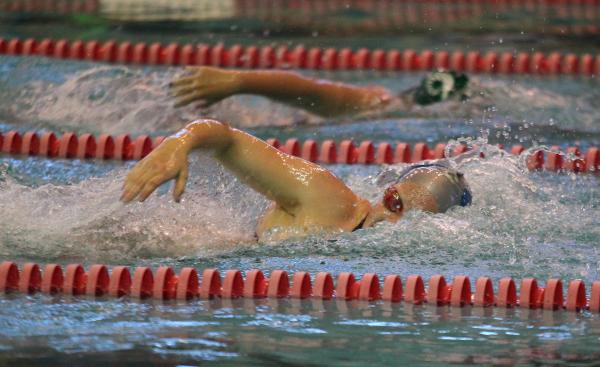 Green Valley’s Brooke Ivey swims her way to winnning the 200-yard freestyle in 1 minut ...