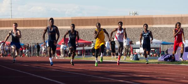Bonanza’s Jayveon Taylor, center in yellow, takes the lead during the boys 100-meter d ...