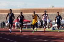 Bonanza’s Jayveon Taylor, center in yellow, takes the lead during the boys 100-meter d ...