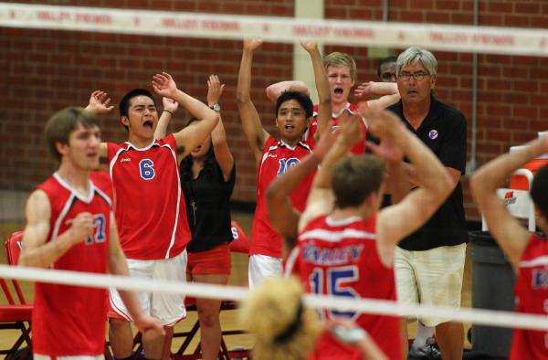 Valley players react after winning a point against Silverado