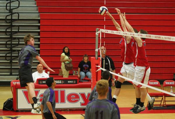Valley’s Zack Ross, right and Jack Heavey, second from right, team up for a block
