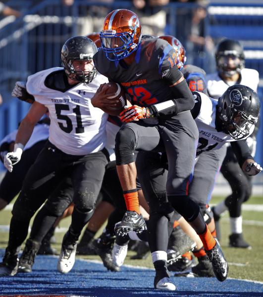 Randall Cunningham of Bishop Gorman runs into the end zone for a touchdown on Saturday. Cunn ...