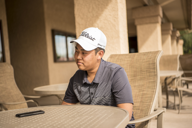 Desert Oasis golf team member Syouta Wakisaka speaks during an interview at Palm Valley Golf ...