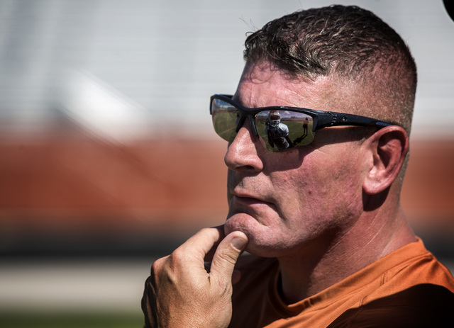 New Legacy High football coach John Isola watches intently during practice Tuesday. The Long ...