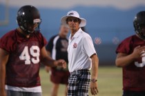 Coach Brad Talich oversees football practice at Desert Oasis High School in Las Vegas on Wed ...