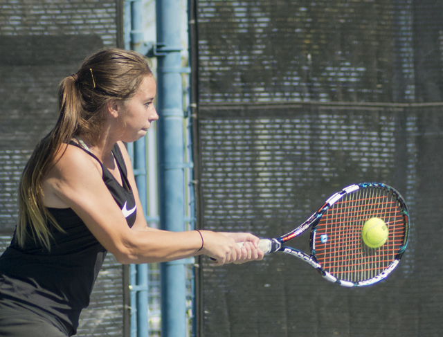 Kristen Newell of Palo Verde High School hits the ball during the Nevada state championship ...