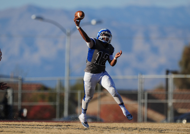Basic Wolves quarterback Aaron McAllister passes against Liberty in the second half of the N ...