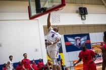 P.J. Washington of Findlay Prep dunks the ball against Planet Athlete Academy at Henderson I ...