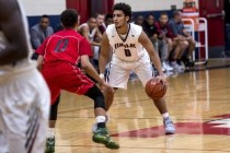 Markus Howard (0) of Findlay Prep dribbles the ball against Planet Athlete Academy at Hender ...