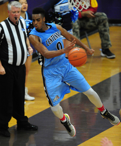 Centennial guard Troy Brown (0) passes while flying out of bounds against Durango in the fou ...