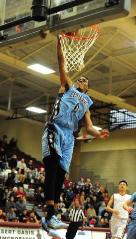 Centennial guard Troy Brown (0) dunks against Desert Oasis in the first quarter of their pre ...