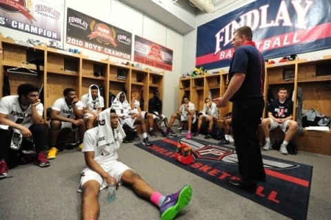Findlay Prep coach Andy Johnson addresses his team during halftime of their game against Las ...