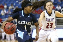 Liberty defender Alexis Tomassi pursues Centennial’s Pam Wilmore during the NIAA Divis ...