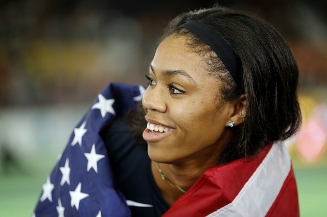 Vashti Cunningham of the U.S. smiles after winning the gold medal in women’s high jump ...