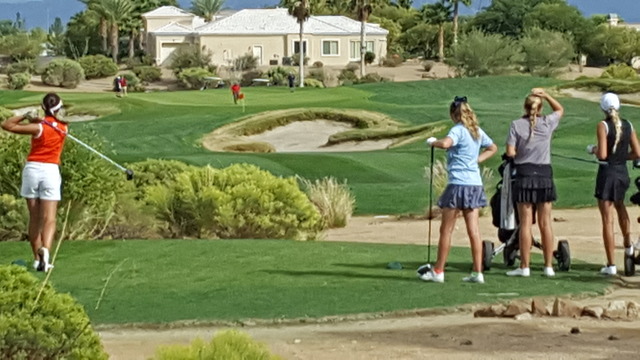 Bishop Gorman’s Hunter Pate, left, watches her tee shot on the 11th hole during the Cl ...