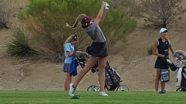 Sydney Smith of Faith Lutheran tees off during the Class 4A Sunset Region girls golf tournam ...