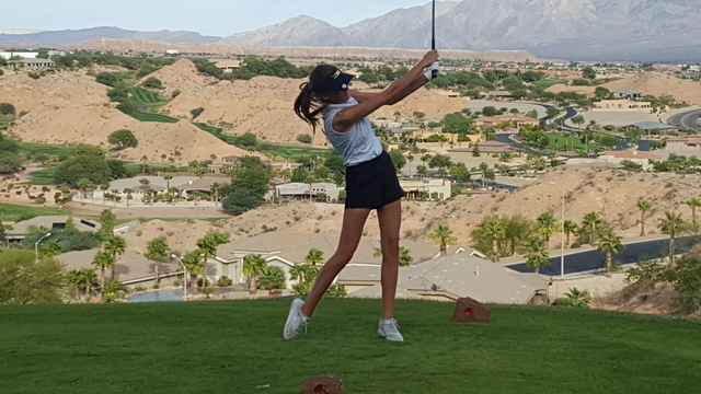Madisan Walker of Boulder City hits her drive on the 16th hole during the Class 3A Southern ...