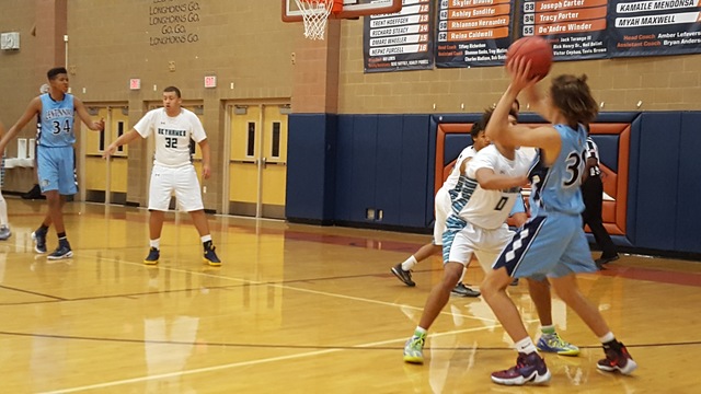 Silverado’s Marcus Strawberry defends Hunter Bohls of Centennial during the second hal ...