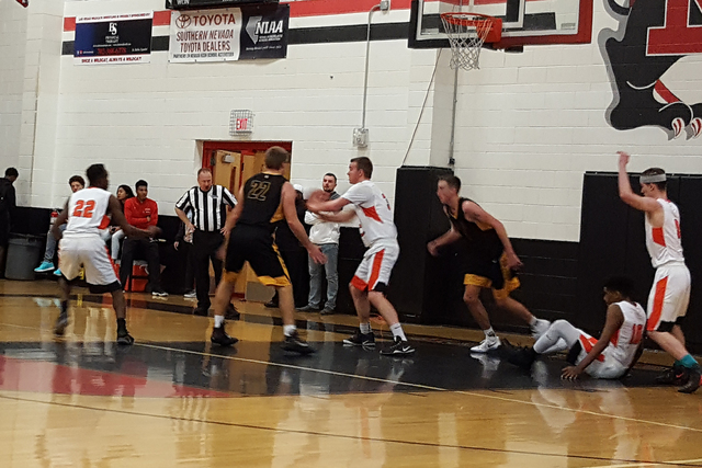 Chaparral’s Jake Richter looks to make an outlet pass after pulling down a rebound in ...