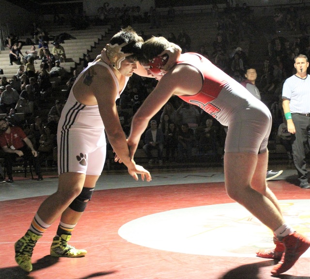 Defending state champion Elias Aguilar III of Bonanza, left, locks up with Arbor View’ ...