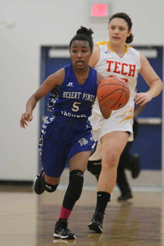 Chrystian Myles (5) brings the ball down the court against Tech in the Lady Wolves Holiday T ...