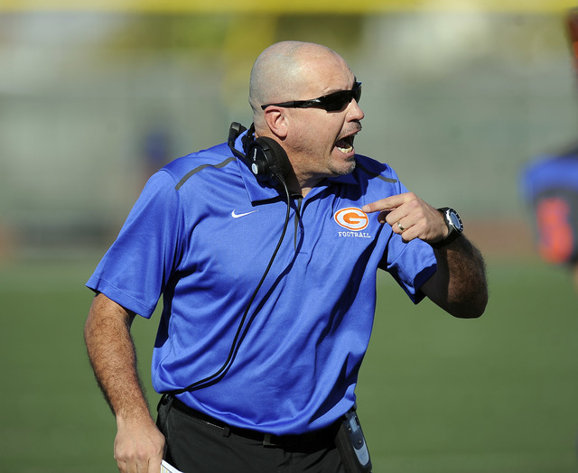 Bishop Gorman head coach Tony Sanchez shouts instructions during their Division I state foot ...