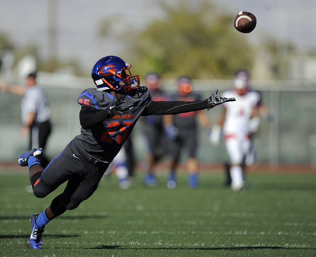 Bishop Gorman wide receiver Tyjon Lindsey (25) is unable to make a reception against Liberty ...