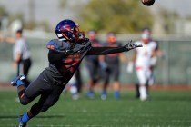 Bishop Gorman wide receiver Tyjon Lindsey (25) is unable to make a reception against Liberty ...