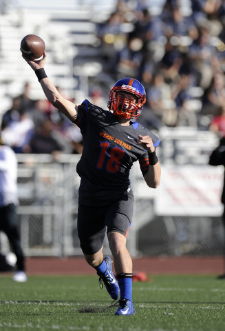 Bishop Gorman quarterback Tate Martell (18) passes in the first half of their Division I st ...