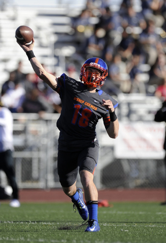 Bishop Gorman quarterback Tate Martell (18) fires a pass in the first half of the Division I ...