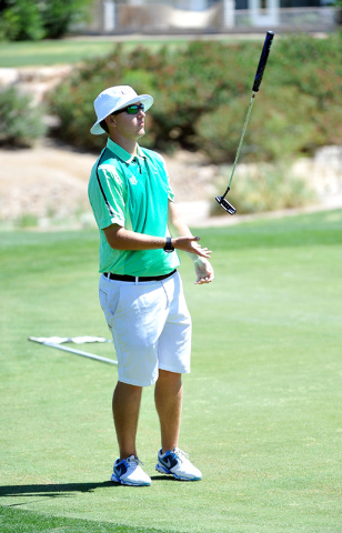 Green Valley’s Grayson Savio reacts after missing a putt on the fifth hole during the ...