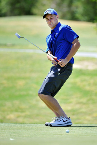 Basic’s J.D. Ebert reacts after missing a putt on the fifth hole during the final roun ...