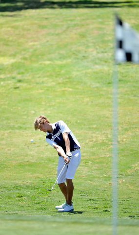 Boulder City’s Luke Logan shoots on the fifth hole during the final round of the Divis ...