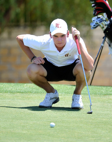 Faith Lutheran’s Charlie Magruder lines up his shot on the fifth hole during the final ...