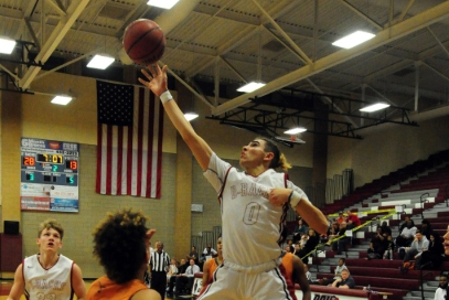Desert Oasis guard Andrue Aguilera, seen shooting against Legacy in a Sunset Region playoff ...