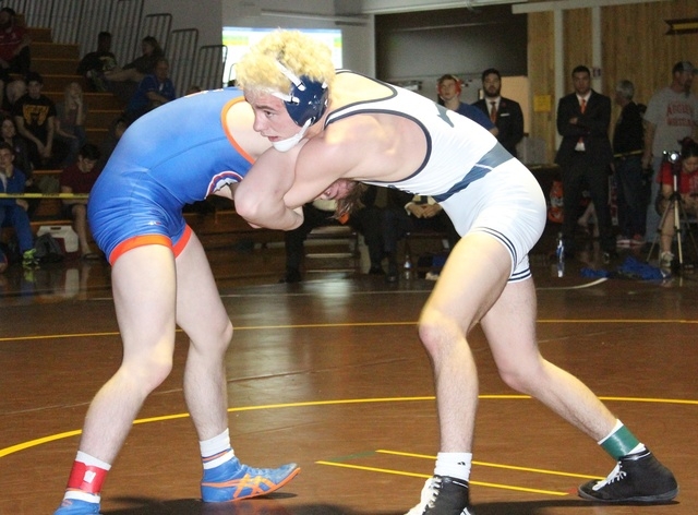 Shadow Ridge’s Brendt Burleson (right) ties up with top-seeded Mason Campbell of Bisho ...
